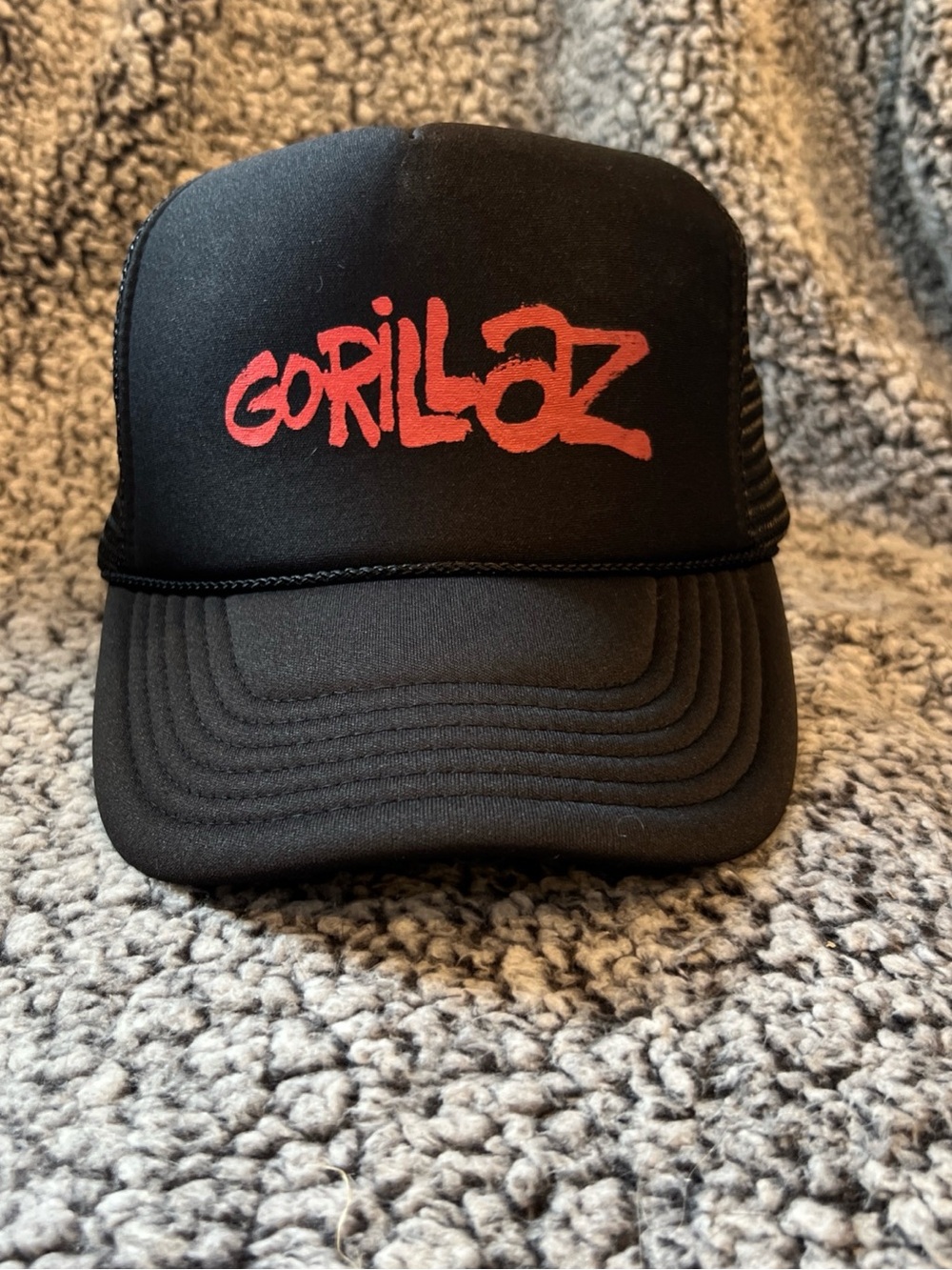 Black Trucker Hat with Gorillaz Red Logo
